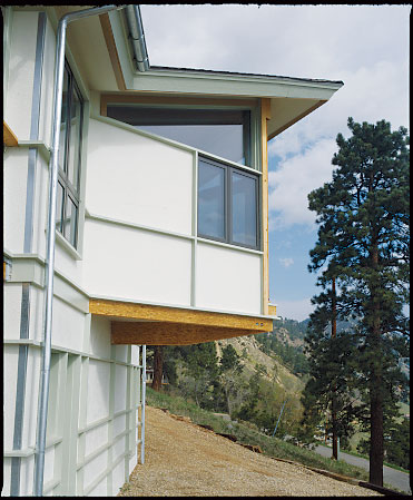 This Trex deck—a composite of recycled plastic and wood fiber—offers stunning views from just outside David Johnston’s home office. The trellis shades the south-facing windows during the summer.